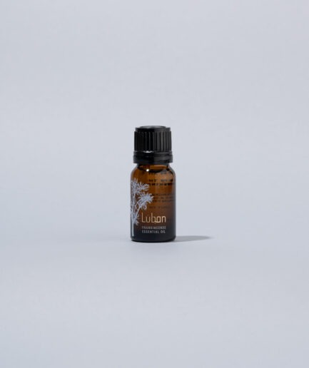 Frankincense essential oil in a small bottle